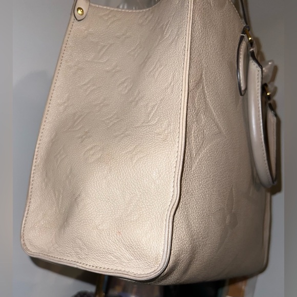Sold Louis Vuitton Monogram Empreinte On the Go MM Tourterelle/beige. W/dusty - Picture 5 of 13